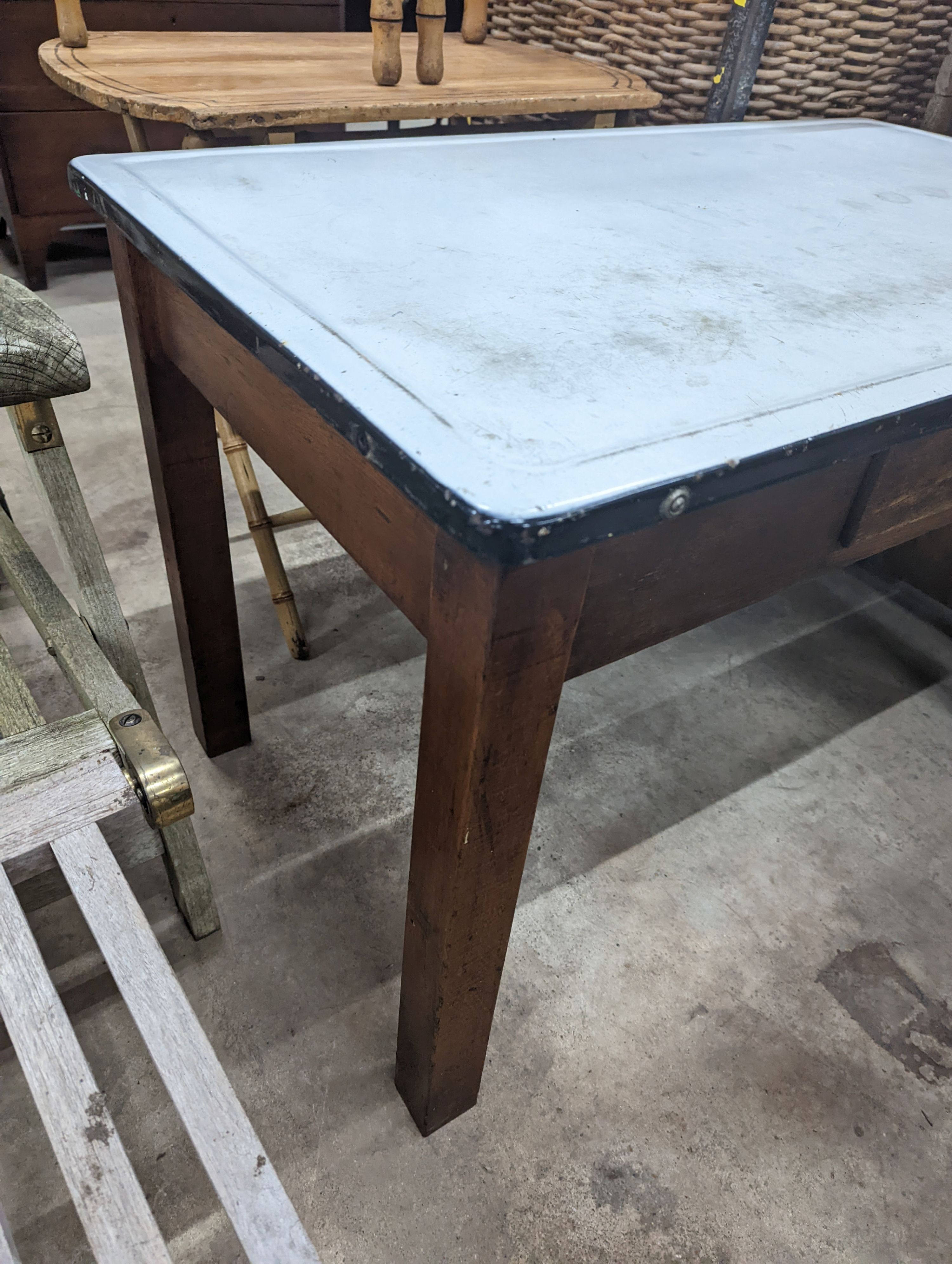 An enamel top kitchen table, width 105cm, depth 63cm, height 68cm